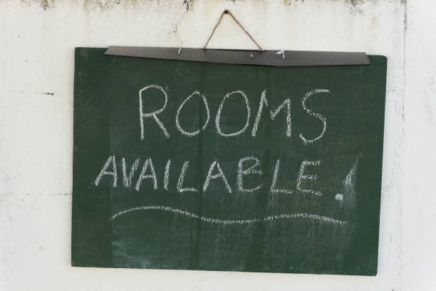 Friendly sustainability signage in a hostel