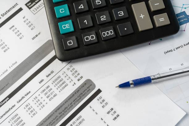 Hostel manager adjusting prices on digital interface